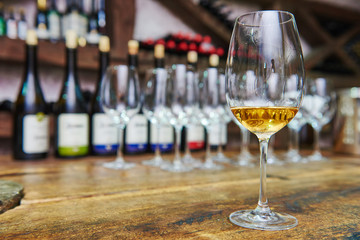 white glass of wine for tasting