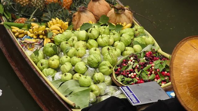 Fruits and vegetables were sold on boat the Damnoen saduak floating market is famous in Thailand