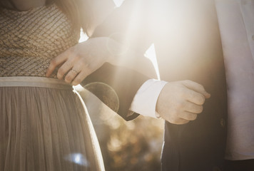 Linked Arms of Couple Getting Married