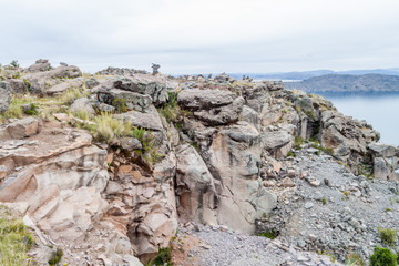 Rocks on Pachatata hill on Amantani island in Titicaca lake, Peru