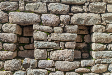 Detail of a stone wall with niches at Machu Picchu ruins, Peru