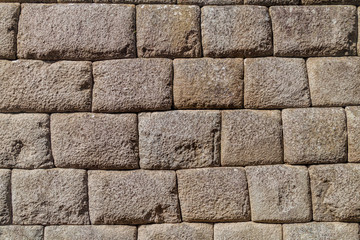 Detail of perfect Inca stonework of Temple of the Sun at Machu Picchu ruins, Peru