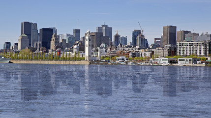 View of Montreal city with reflection on the water, day