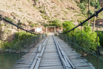 Bridge over Urubamba river in Pichingoto village in Sacred Valley of Incas, Peru