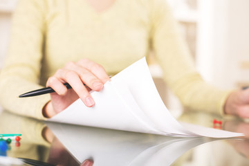 Woman going through documents