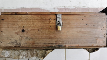 Padlocked wooden box-shed at Tham Jang cave foot. Vang Vieng-Laos.4734