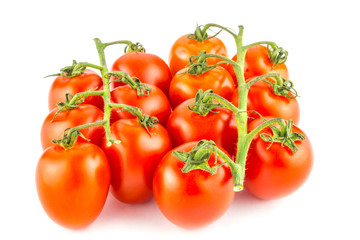 Cherry tomato bunch closeup isolated on white background