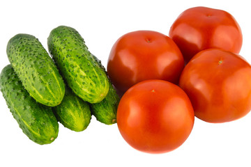 Cucumber and tomato isolated on white background close up