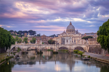 Fototapeta na wymiar Scenic view of colorful sunrise over St Peters basilica in Rome
