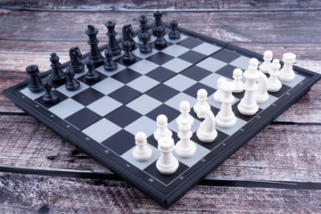 Chess On Wooden Background. 