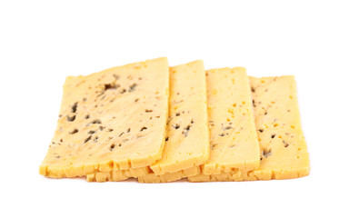Multiple yellow cheese slices isolated