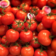 fresh Red juicy delicious tomatoes in the market