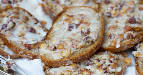 Slices of bread with lard and greaves
