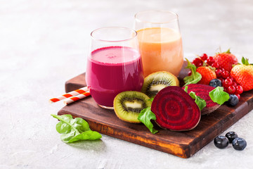 Detox diet - smoothies from beet and carrots. Selective focus. Copy space