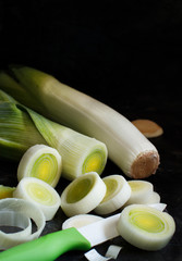 Fresh leeks whole and sliced