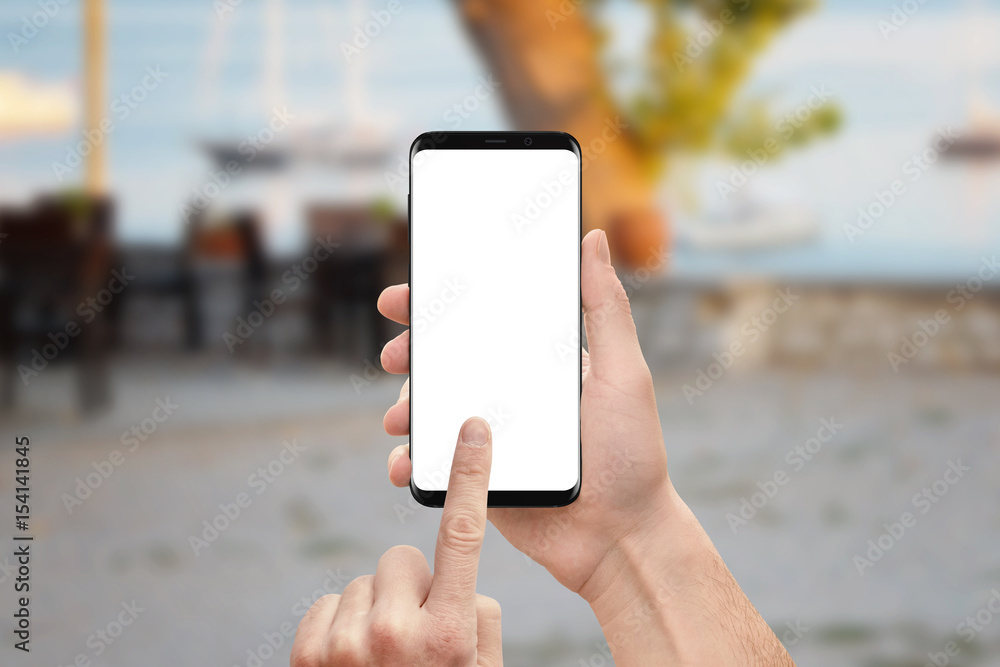 Poster man holding modern smart phone with round display edges. isolated white screen for mockup. left hand