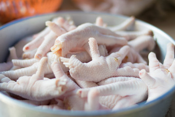 Fresh chicken foot in the kitchen