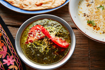 Palak Panner indian recipe food on wood