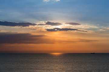 Fototapeta na wymiar Beauty sunset over seacoast skyline, natural landscape background