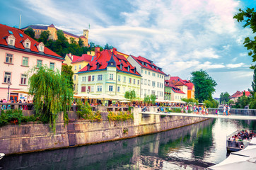 Cityscape view on Ljubljanica river canal in Ljubljana old town. Ljubljana is the capital of...