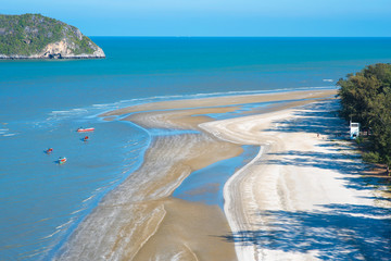 Fototapeta premium Khao Sam Roi Yot National Park (near Hua Hin) - tourists disembark from boats to the beach being on their way to Phraya Nakhon Cave. Nature of Prachuap Khiri Khan province, Thailand