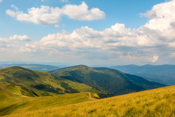 Fototapeta na wymiar Clouds over the Summer Carpathian Mountains