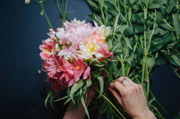 Flowers on black background. Decoration of different flowers. Mixed flowers. Fresh flowers.