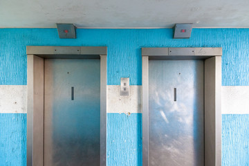 Two elevators in a council housing apartment