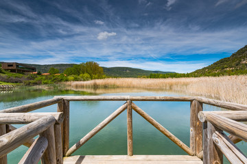 Timber footpath over lake Una,Spain