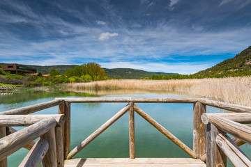 Fototapeta premium Timber footpath over lake Una,Spain
