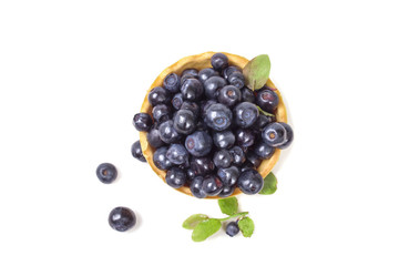 Full small edible basket with blueberries