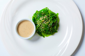 Seaweed chuka salad garnished with sesame seeds