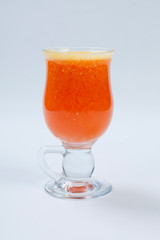 Glass of Orange Smoothie on white background