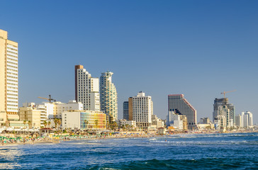Obraz premium Sunny day at central public beach in Tel-Aviv, Mediterranean seashore