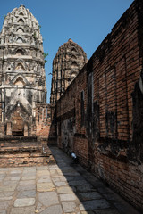 Fototapeta na wymiar Pagoda at Wat Si Sawai, Sukhothai Historical Park, Sukhothai Thailand