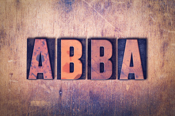 Fototapeta premium Abba Theme Letterpress Word on Wood Background