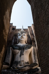 Ancient buddha statue Wat Si Chum in Sukhothai Historical Park, Sukhothai Province, Thailand