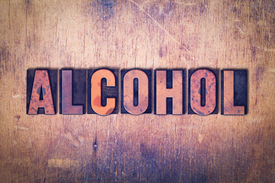 Alcohol Theme Letterpress Word on Wood Background