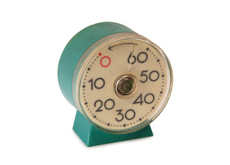 Old mechanical alarm clock on white background