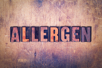 Allergen Theme Letterpress Word on Wood Background