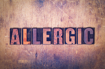 Allergic Theme Letterpress Word on Wood Background