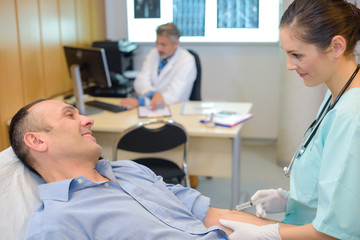 Obraz premium nurse holding a syringe