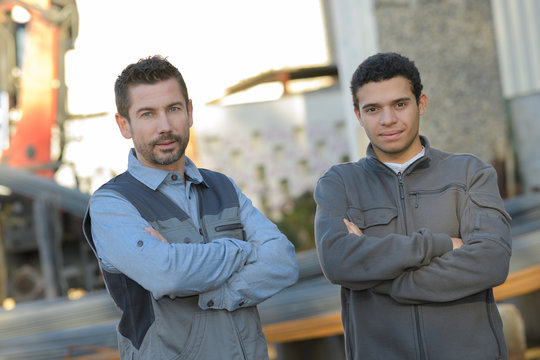 portrait of a confident supervisors outside warehouse