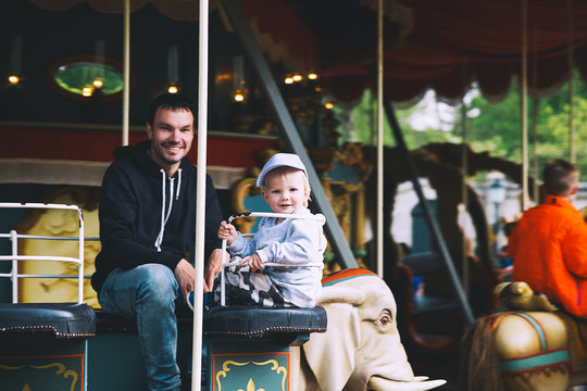 Family is having fun at amusement park Efteling, Netherlands.