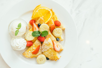 Pancake and Bread toast with mixed fruit