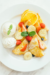 Pancake and Bread toast with mixed fruit