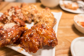 Korean style spicy sauce deep fried chicken wing