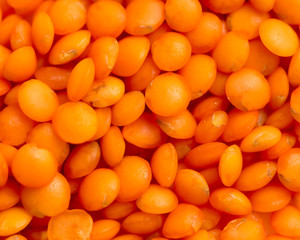 Red lentils as background. macro