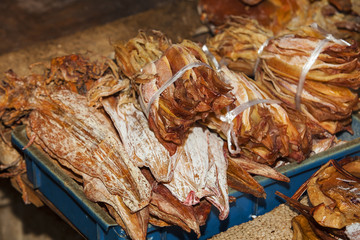 Traditional Asian fish market stall, full of dried seafood. Closed up.