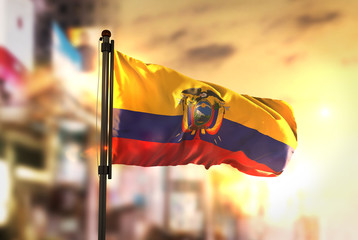 Ecuador Flag Against City Blurred Background At Sunrise Backlight